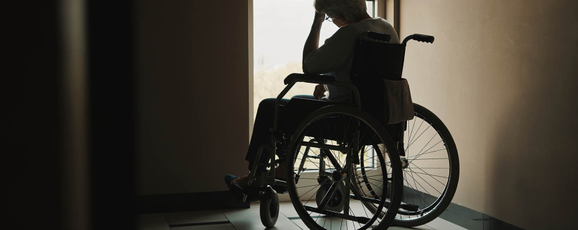 injured person in wheelchair